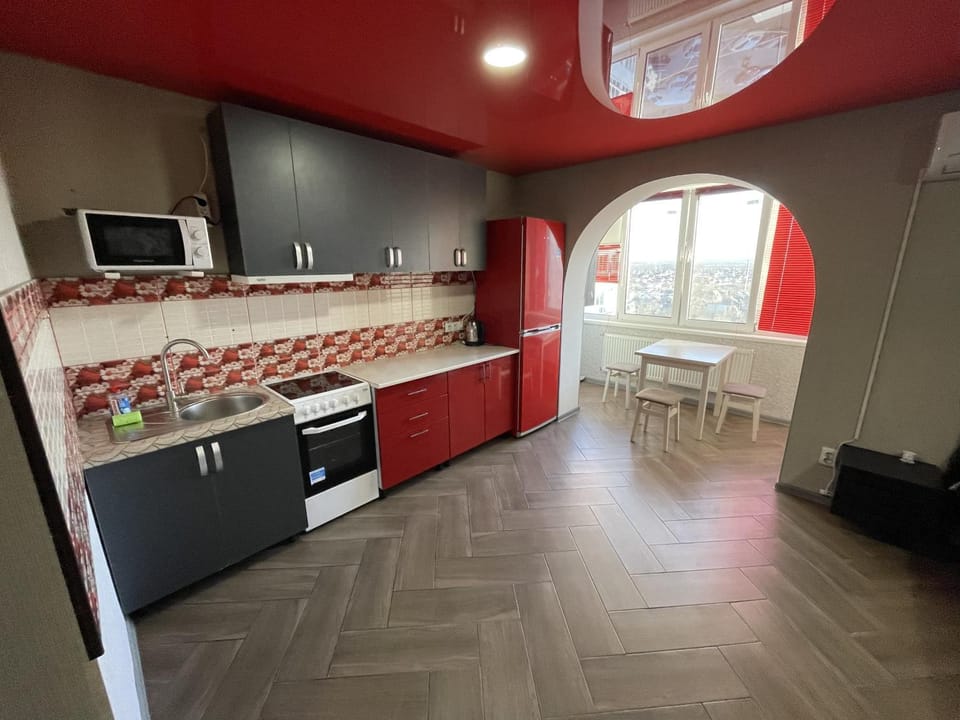 Kitchen or kitchenette, microwave, stove