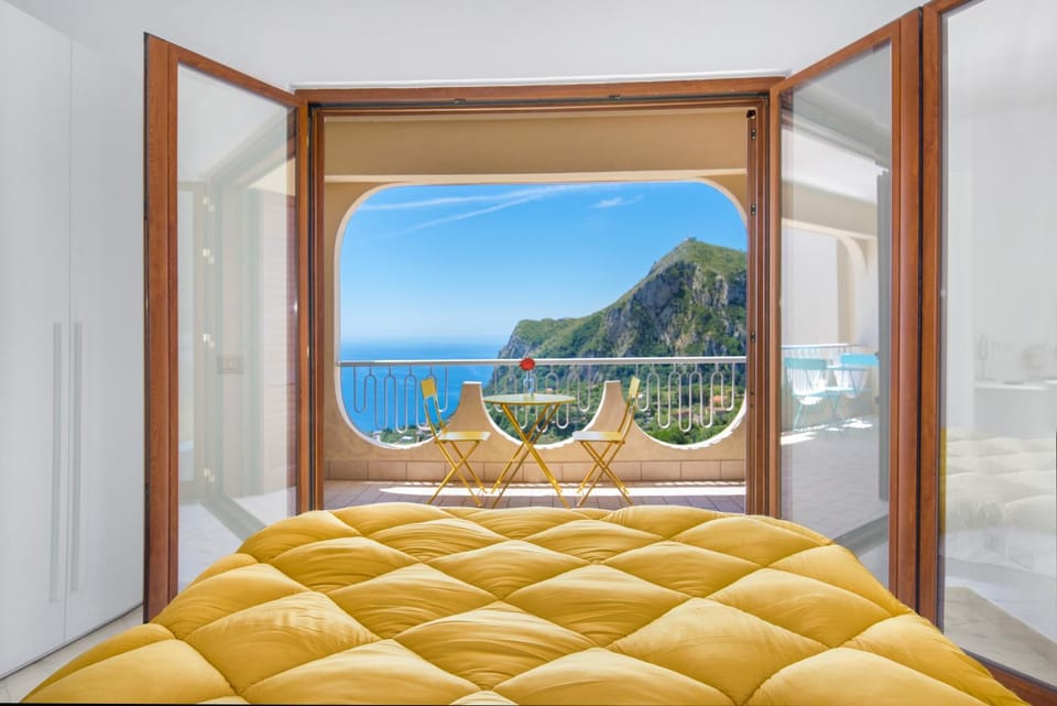 View (from property/room), Decorative detail, Bedroom, Landmark view, Mountain view, Sea view