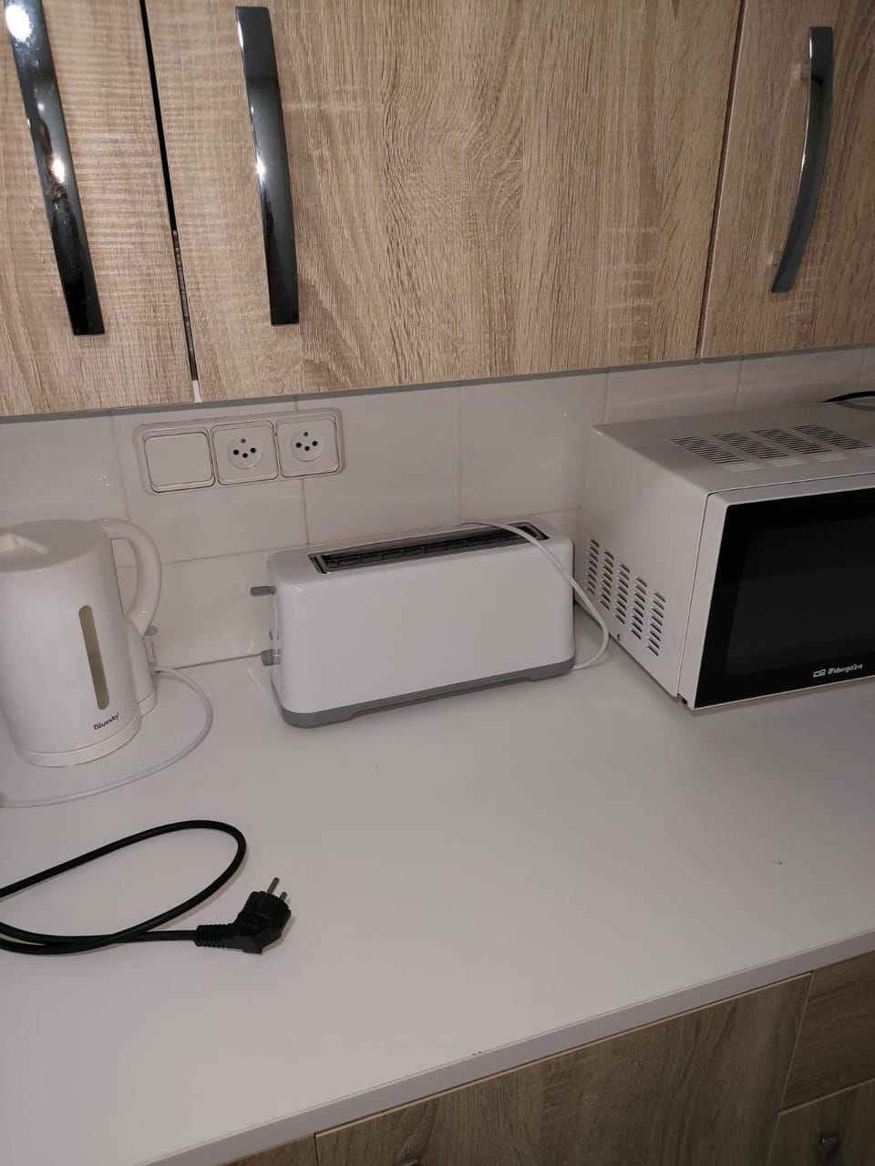Kitchen or kitchenette, toaster