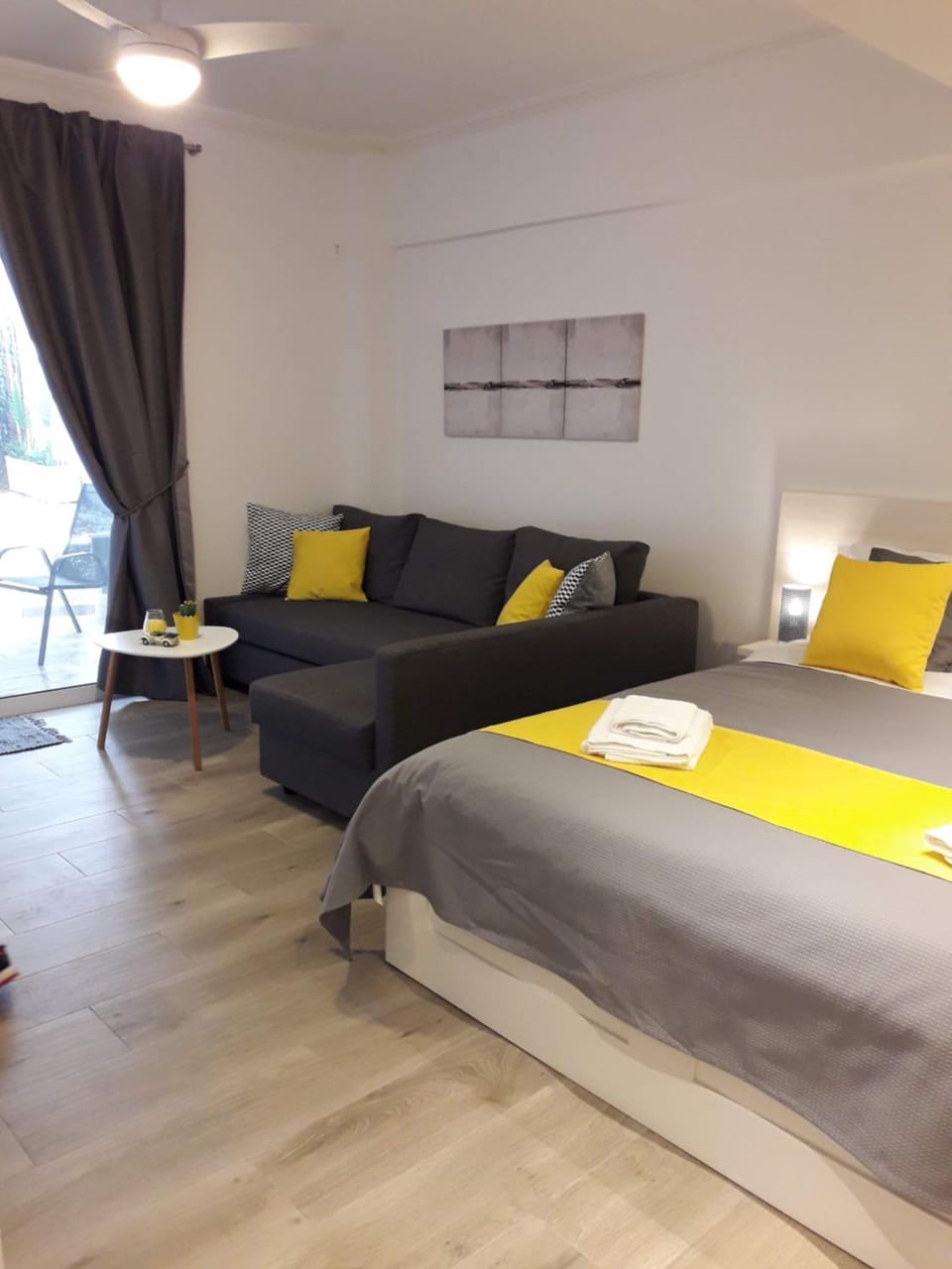 Bed, Living room, Seating area, Bedroom