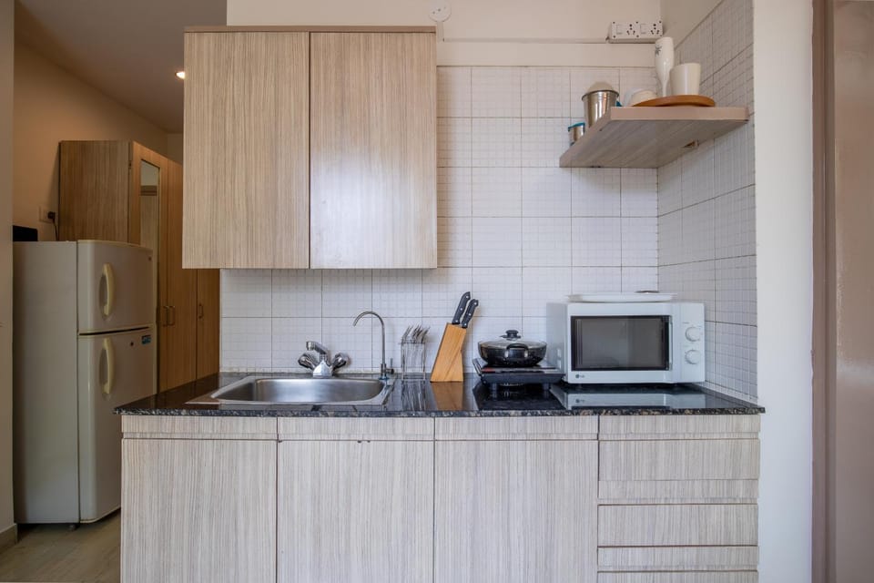 Kitchen or kitchenette, microwave