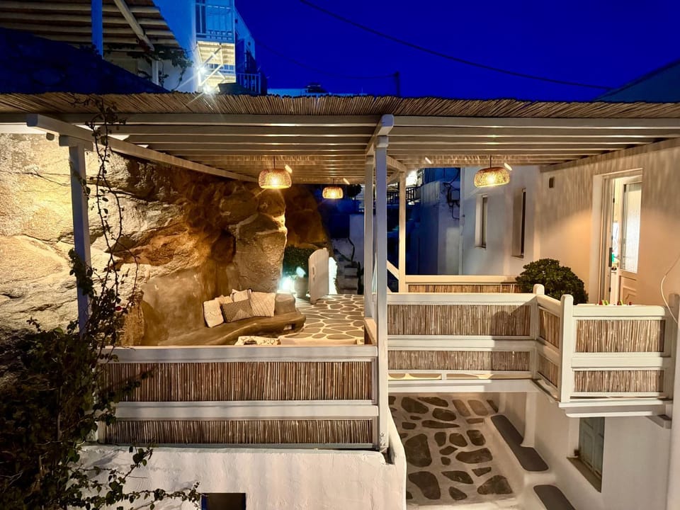 Property building, Patio, Night, Balcony/Terrace, Seating area