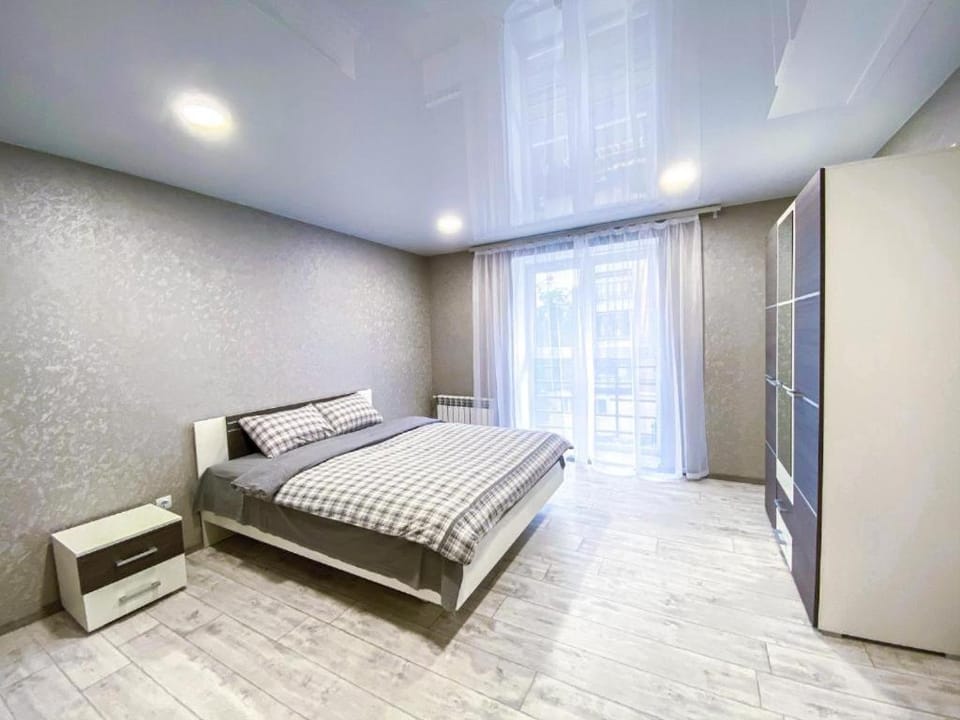 ApartPoltava 2 ОКРЕМІ кімнати, новобудова, ДВА великих ліжка ЦЕНТР, КОРПУСНИЙ САД Apartment in Ukraine
