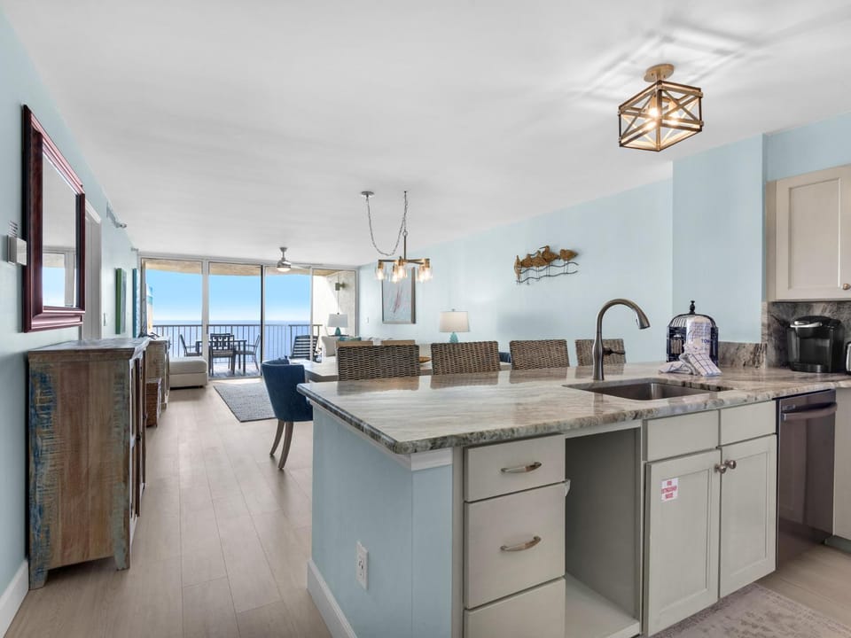 Day, TV and multimedia, View (from property/room), Kitchen or kitchenette, Living room, Seating area, Dining area, Sea view, dishwasher, furniture, microwave, wardrobe