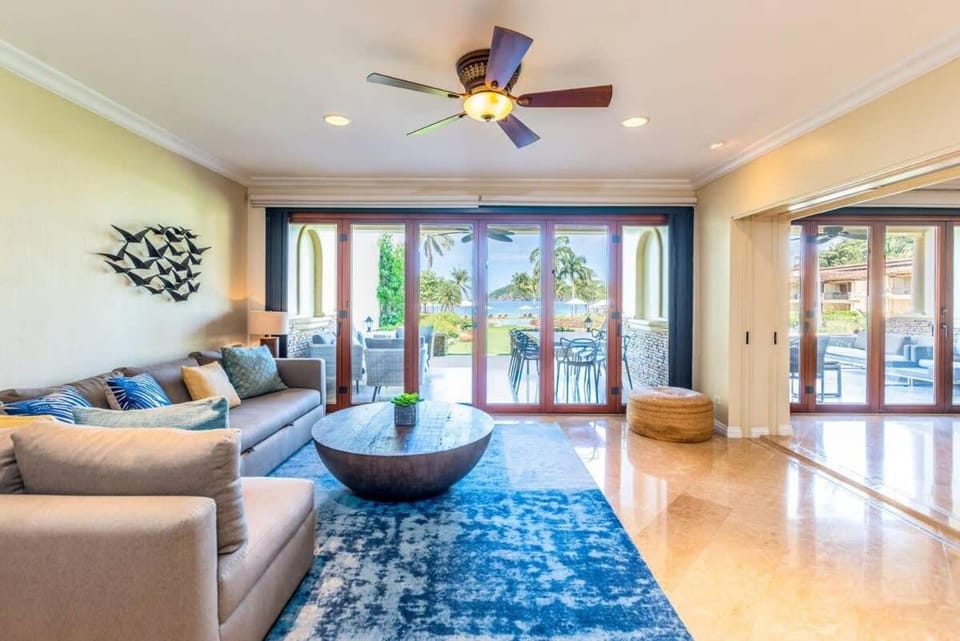 Spacious Open-Concept Condo with Stylish Design, Direct Beach Access & Resort-Style Amenities House in Playa Flamingo