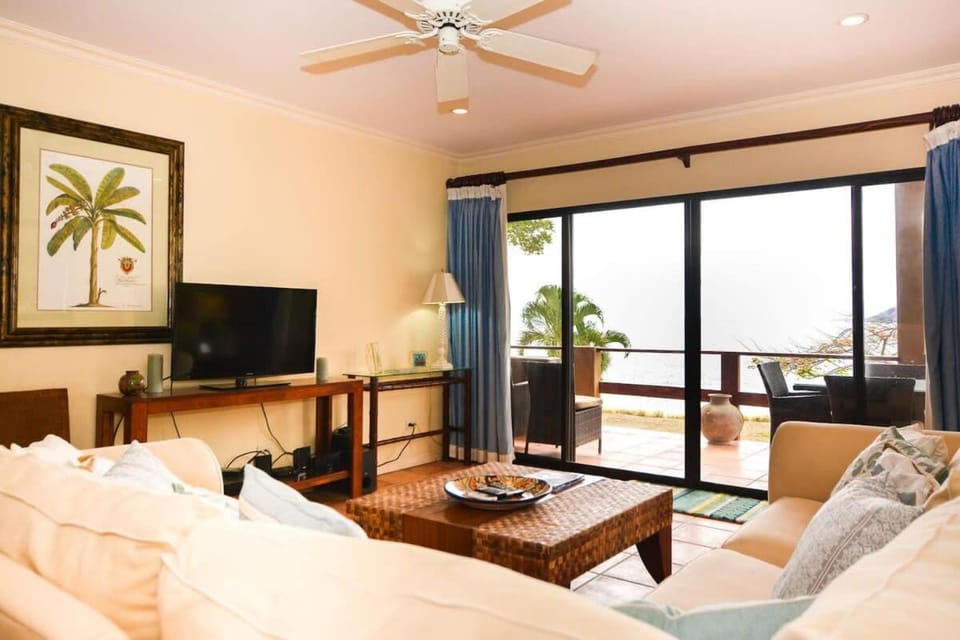 Elegant 3BR Beachfront Condo with Spacious Interior, Ocean-View Terrace & Direct Access to Playa Flamingo House in Playa Flamingo