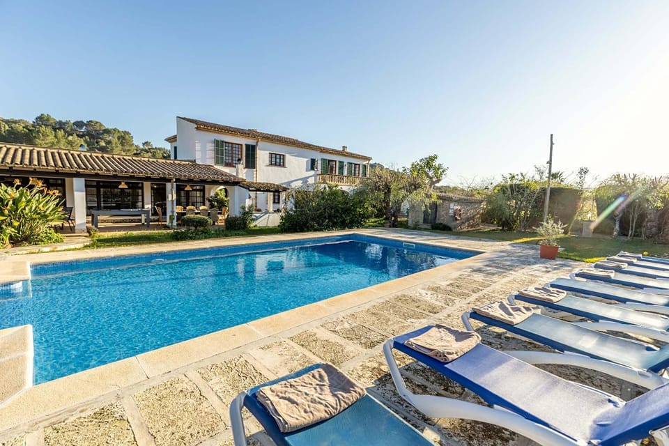 Property building, Patio, Pool view, Swimming pool, sunbed