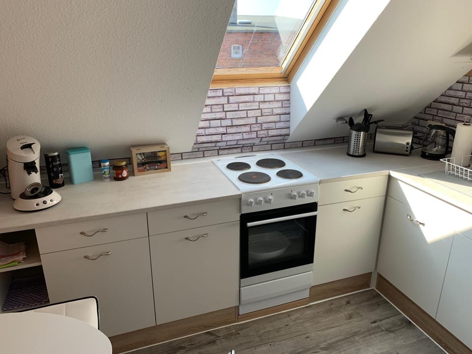 Kitchen or kitchenette, dishwasher, stove, kitchen