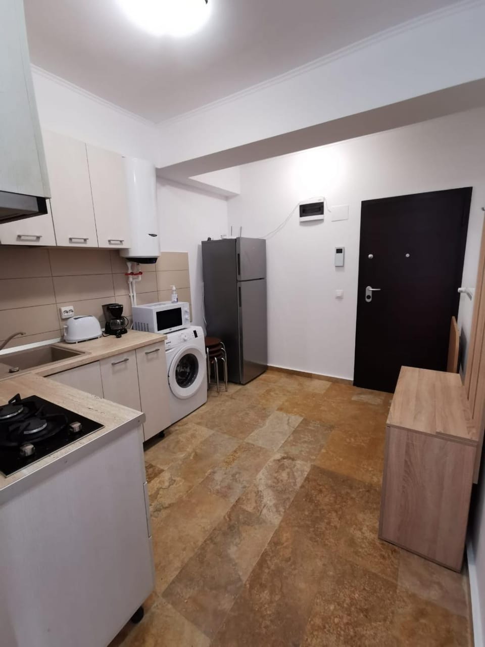 Kitchen or kitchenette, washing machine