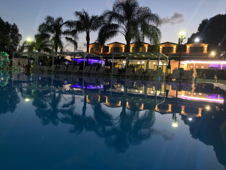 Property building, Patio, Restaurant/places to eat, Facade/entrance, Spring, People, People, People, Natural landscape, Summer, Children play ground, Children play ground, Darts, Darts, Bathroom, Bedroom, Food, Pool view, Pool view, Swimming pool, Swimming pool, Swimming pool, Breakfast, Dinner, Certificate/Award, Certificate/Award, Certificate/Award, Facility for disabled guests, acessibility