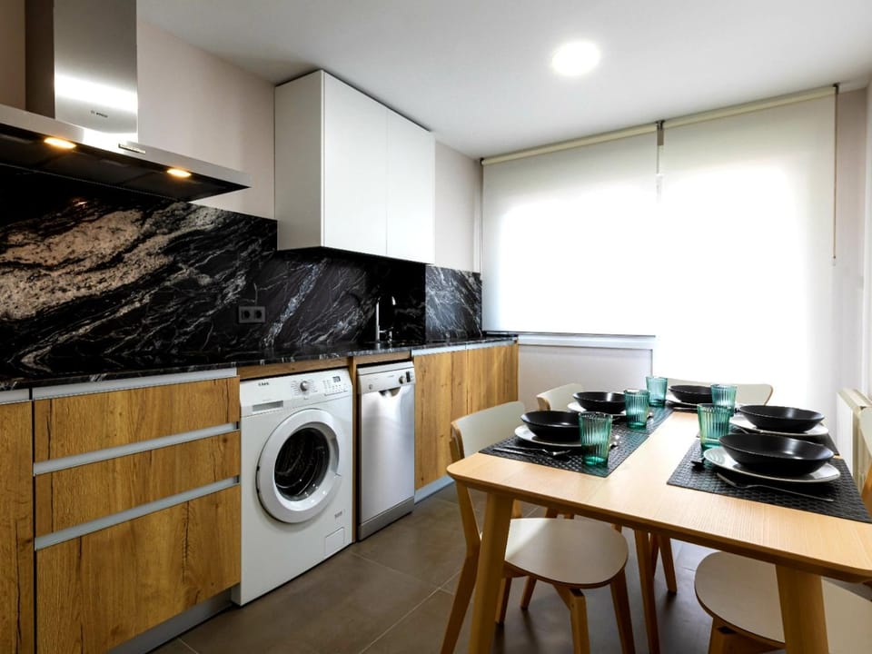 Kitchen or kitchenette, Dining area, dishwasher, washing machine