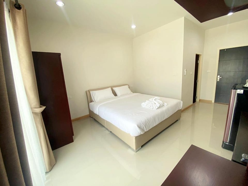 Property building, Staff, Staff, Facade/entrance, Bed, Off site, Day, Night, People, People, Activities, Bird's eye view, Bowling, Karaoke, View (from property/room), Balcony/Terrace, Lobby or reception, Other, Other, Photo of the whole room, Decorative detail, Floor plan, Evening entertainment, Bedroom, Communal kitchen, On site, City view, Garden view, Landmark view, Street view, Area and facilities, Sports, Entertainment, Time of day, Location, Sunrise, Sunset, Family, Family