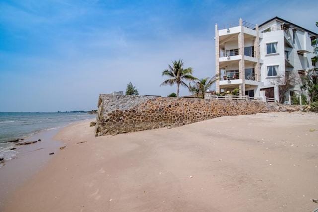 Property building, Day, Natural landscape, Beach, Sea view
