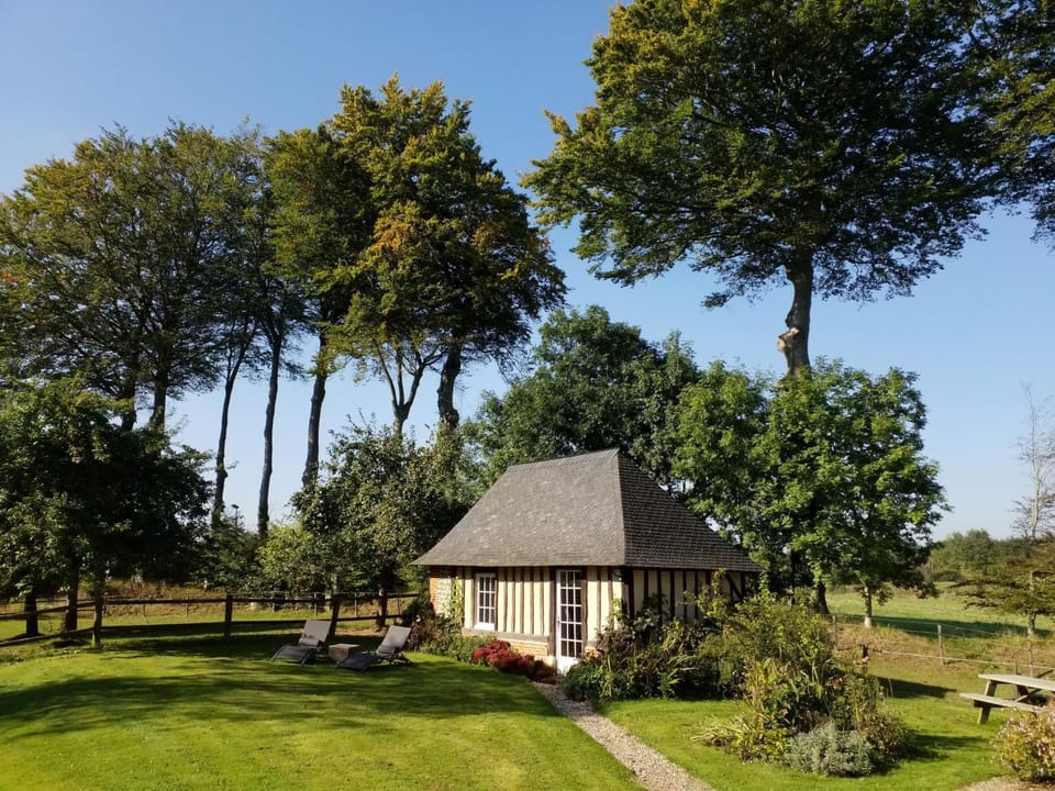 Property building, Text overlay, Garden view