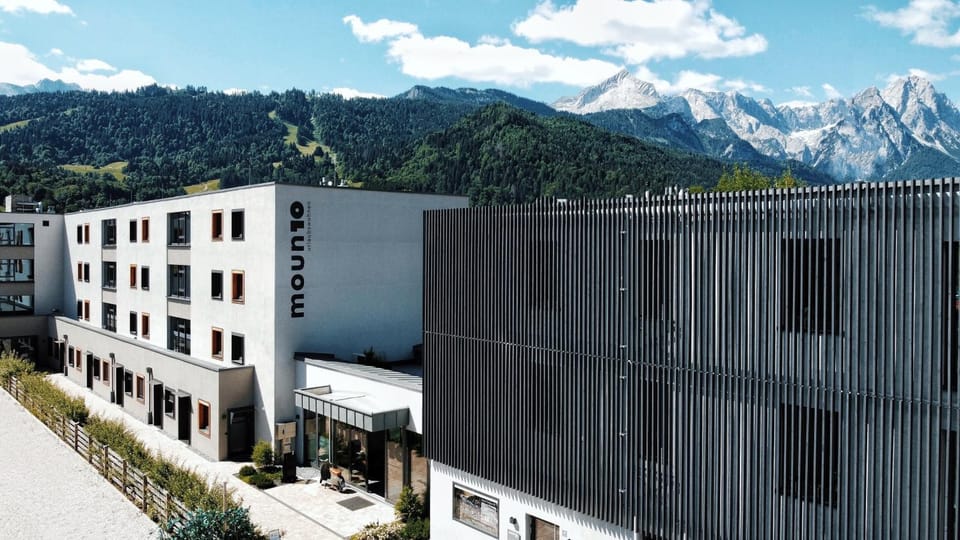 Property building, Nearby landmark, Spring, Natural landscape, Mountain view