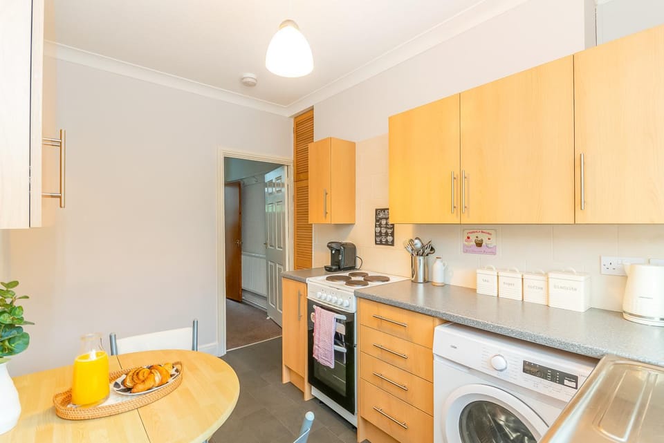 Kitchen or kitchenette, stove, toaster