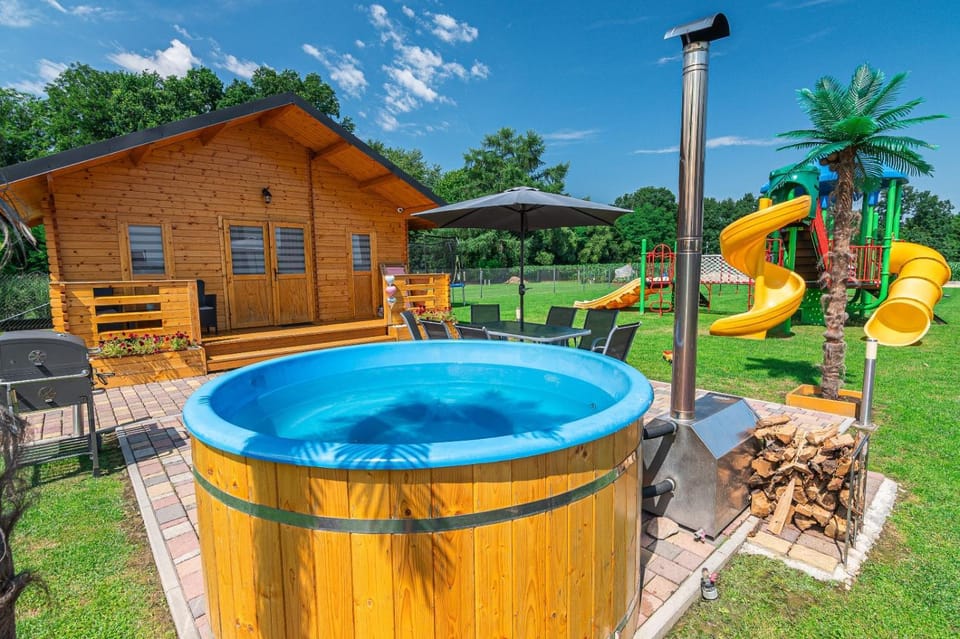 Nocleg Zator Domki Paradise Pod Palmami House in Lesser Poland Voivodeship