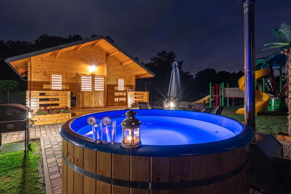 Nocleg Zator Domki Paradise Pod Palmami House in Lesser Poland Voivodeship