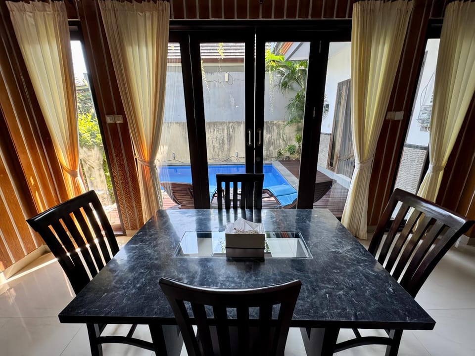 Patio, Living room, Seating area, Dining area, Pool view, Swimming pool