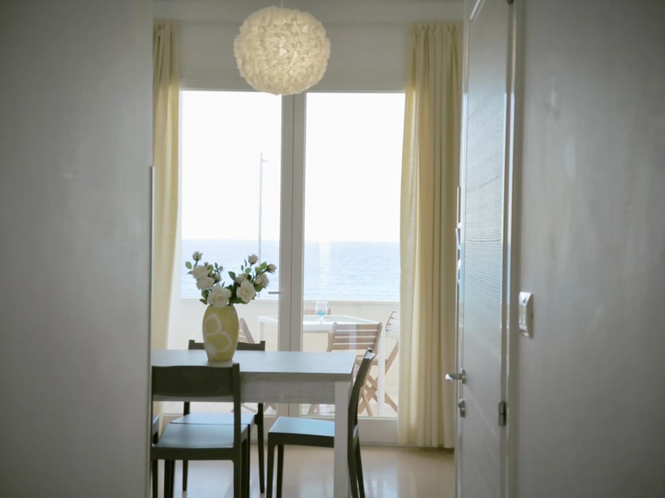 Natural landscape, Living room, Seating area, Dining area, Sea view