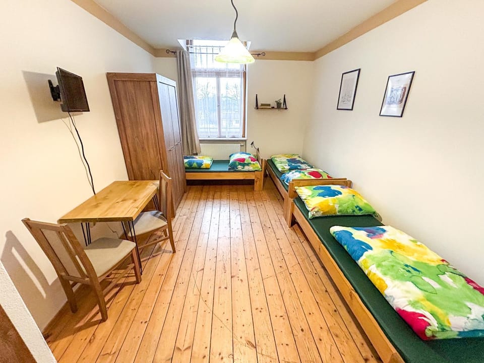 Bed, Seating area, wardrobe
