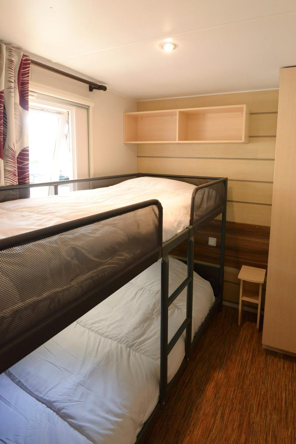 Photo of the whole room, bunk bed, wardrobe