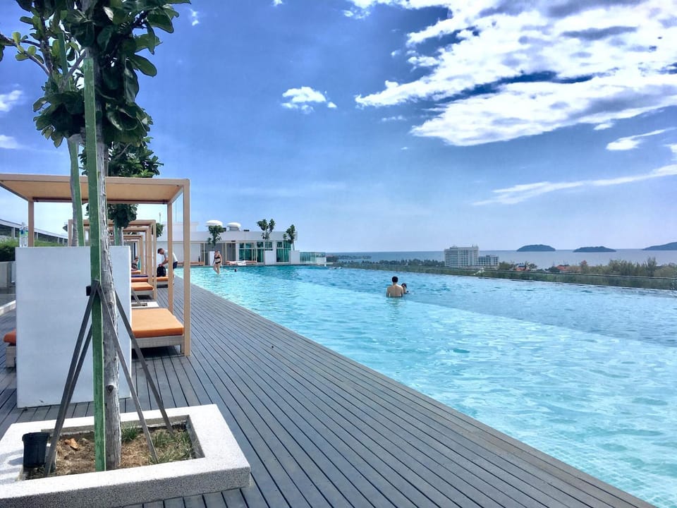 Property building, Day, Pool view, sunbed
