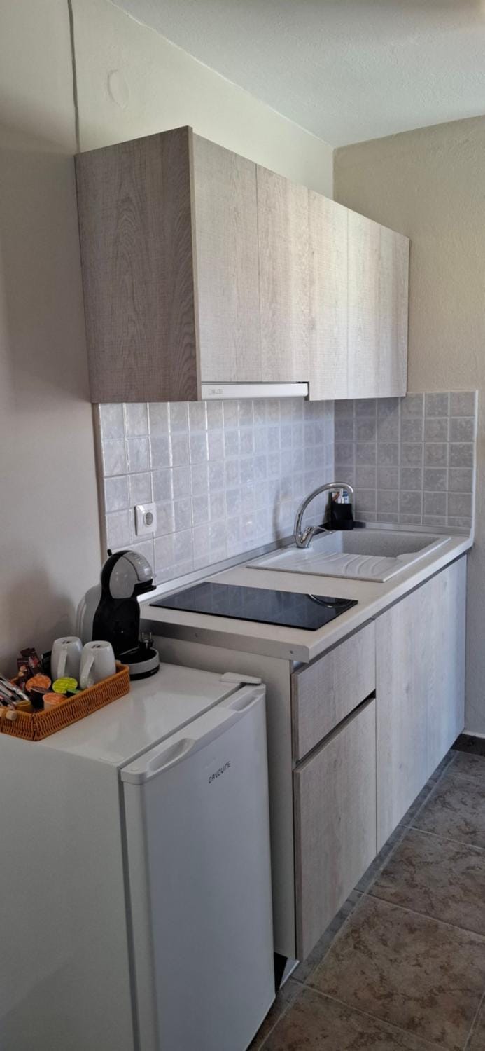 Kitchen or kitchenette, stove