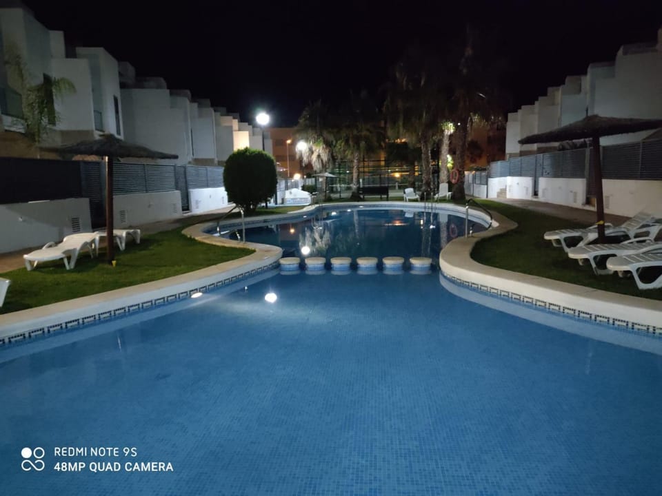 Night, Pool view, Swimming pool, sunbed