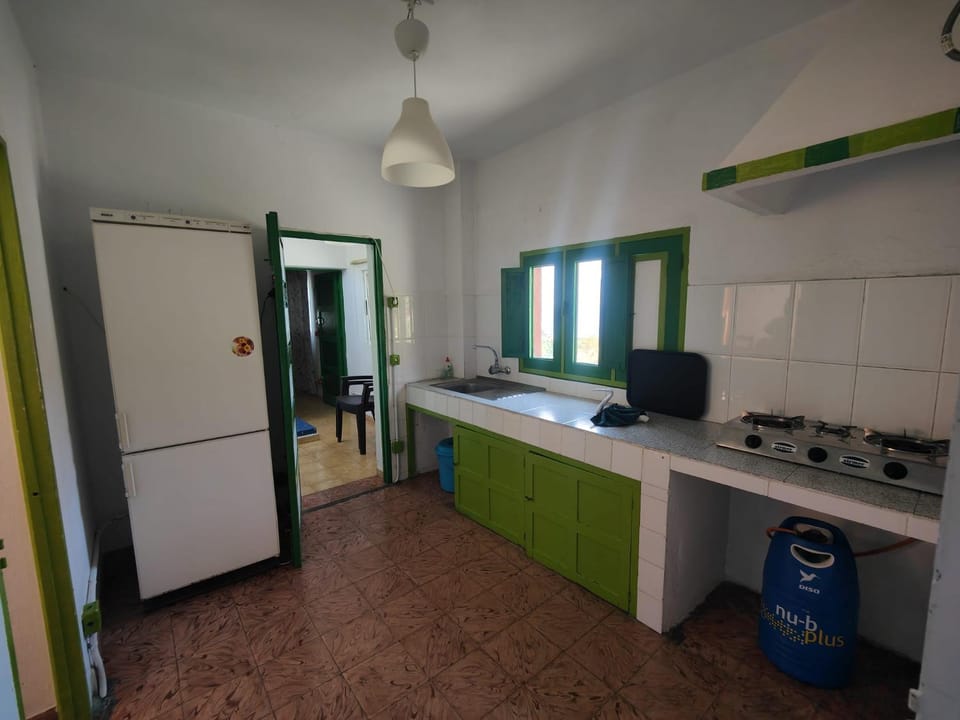 Kitchen or kitchenette, stove, kitchen