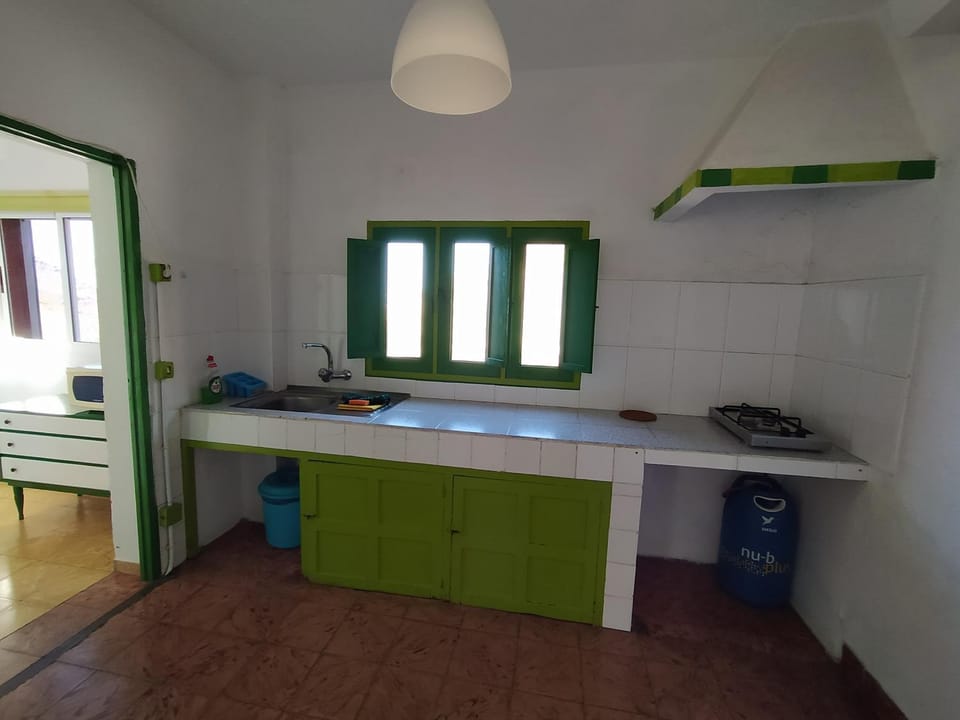 Kitchen or kitchenette, stove, kitchen