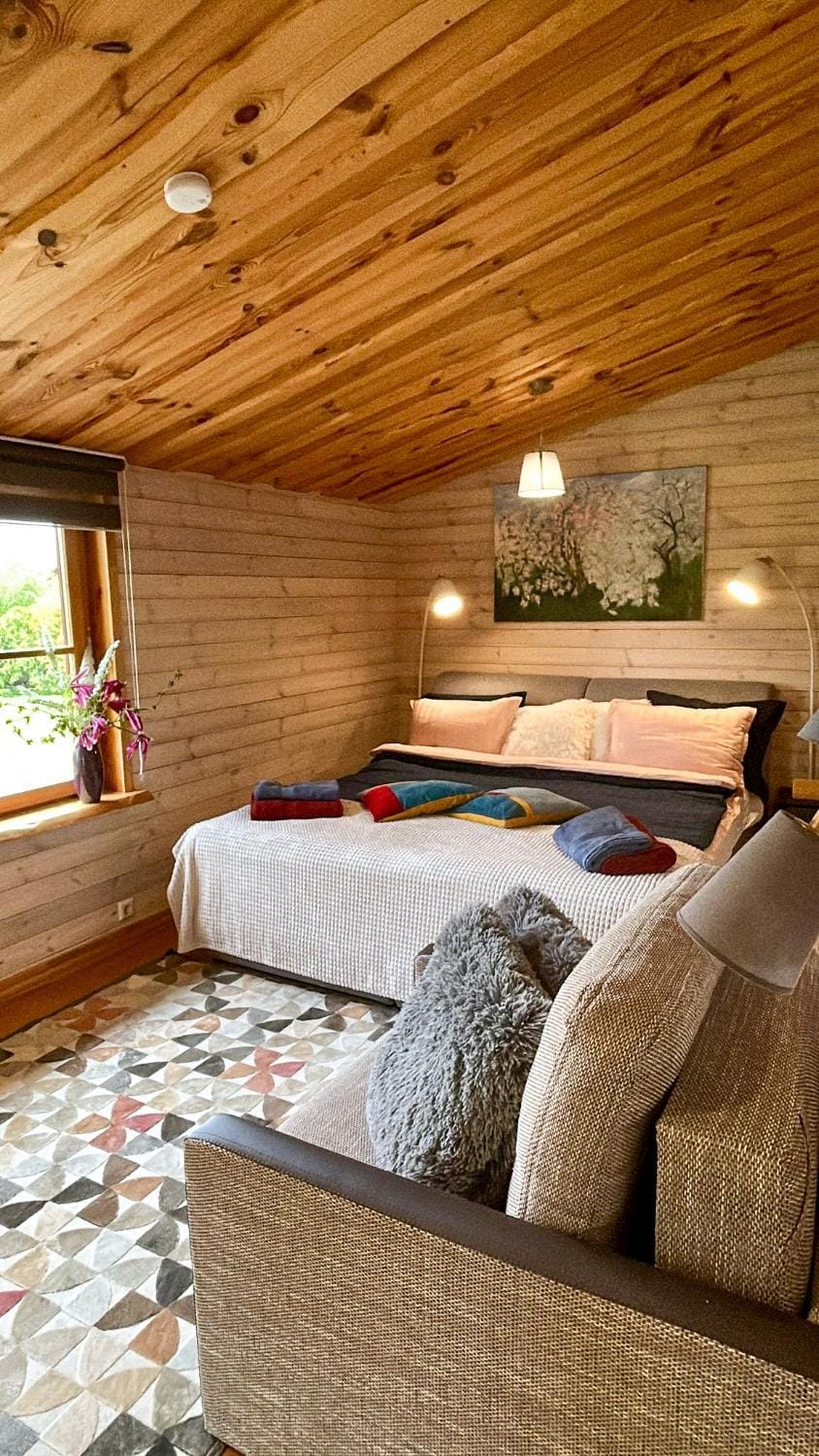 Bed, Living room, Seating area, Bedroom