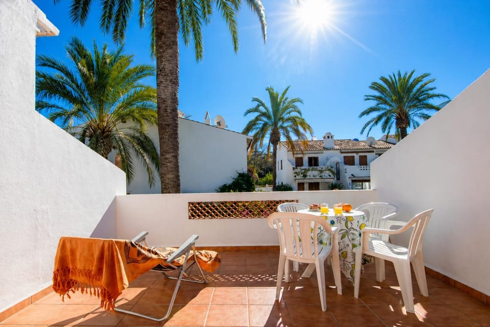 Property building, Patio, Day, View (from property/room), Balcony/Terrace, Living room, Seating area, Dining area, sunbed