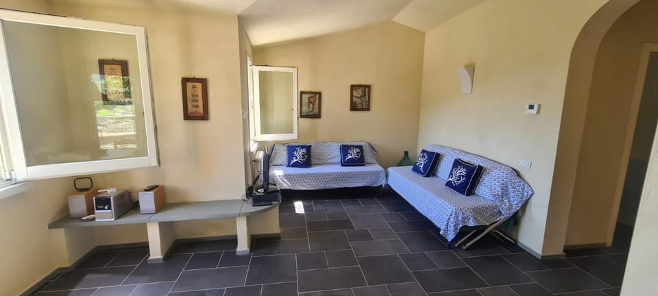 Bed, Living room, Seating area, Bedroom