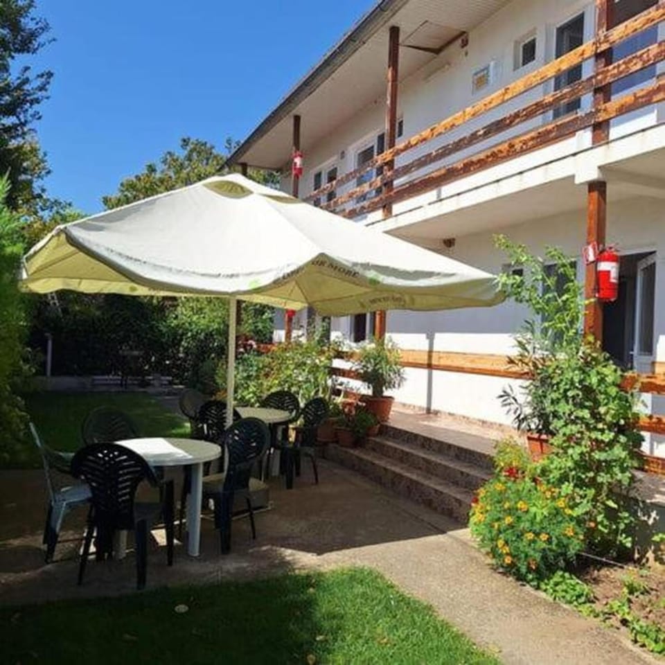 Property building, Patio, Spring, Day, Garden, View (from property/room), Balcony/Terrace, Dining area, Garden view