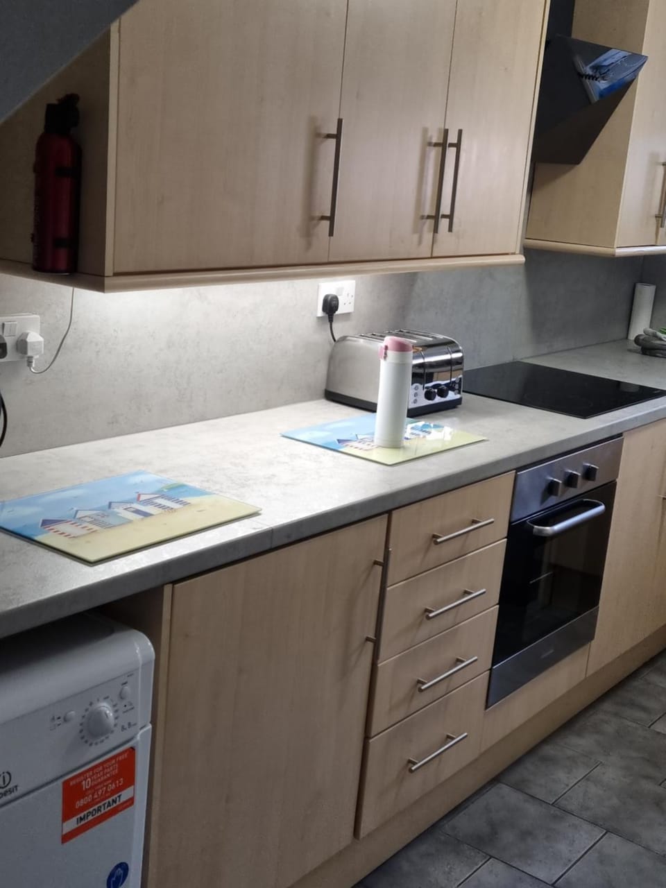 Kitchen or kitchenette, stove, toaster