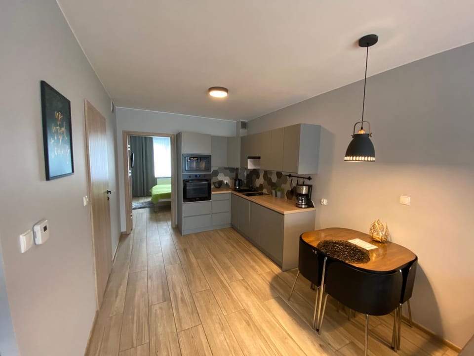 Kitchen or kitchenette, Living room, Seating area, Dining area, Communal kitchen