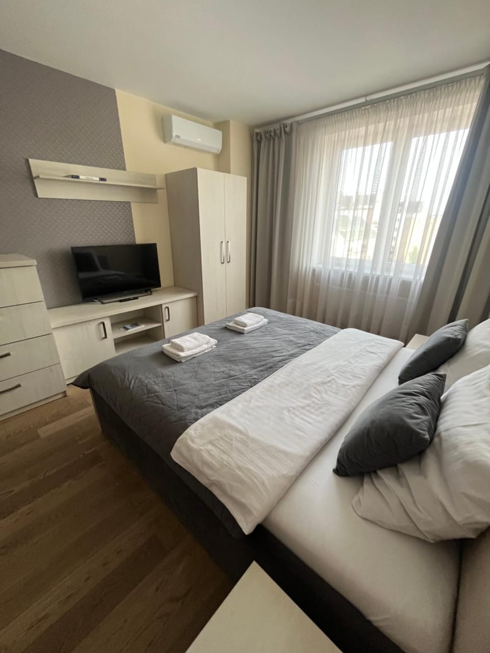 Bed, TV and multimedia, Bedroom, towels, wardrobe, air conditioner