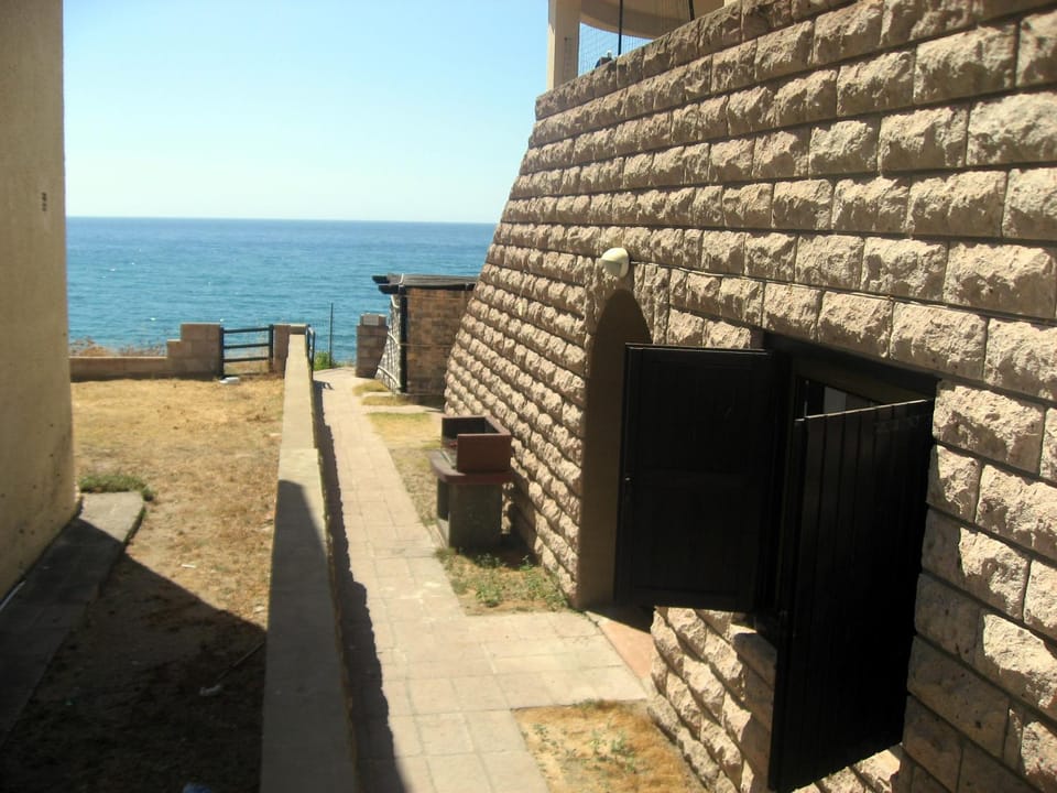 Nice apartments in waterfront villa in Bosa Porto Alabe Apartment in Sardinia