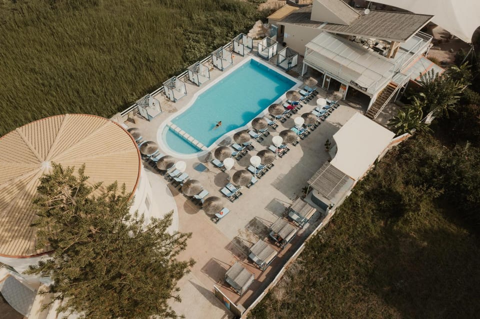 Property building, Natural landscape, Bird's eye view, Pool view, Swimming pool