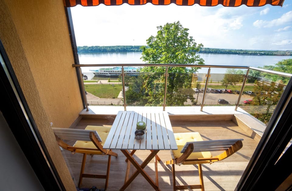 Balcony/Terrace, Seating area, Garden view, River view