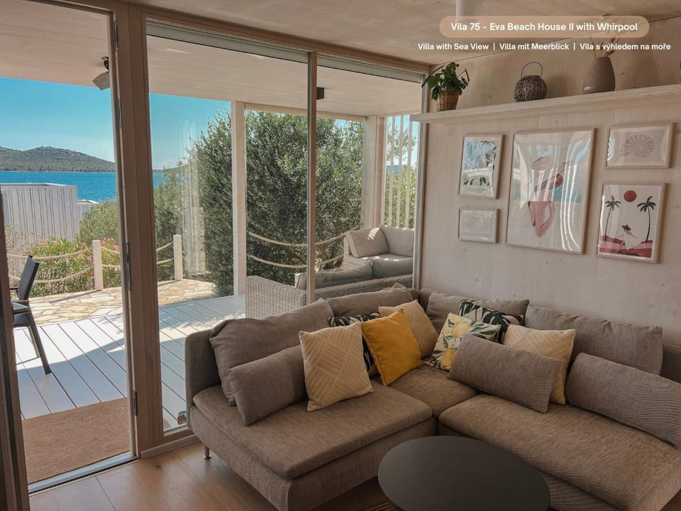 View (from property/room), Living room, Seating area, Sea view