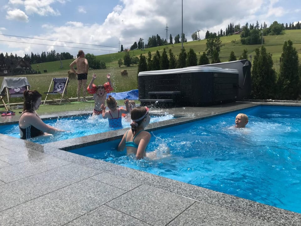 Property building, Day, Swimming pool, children, group of guests