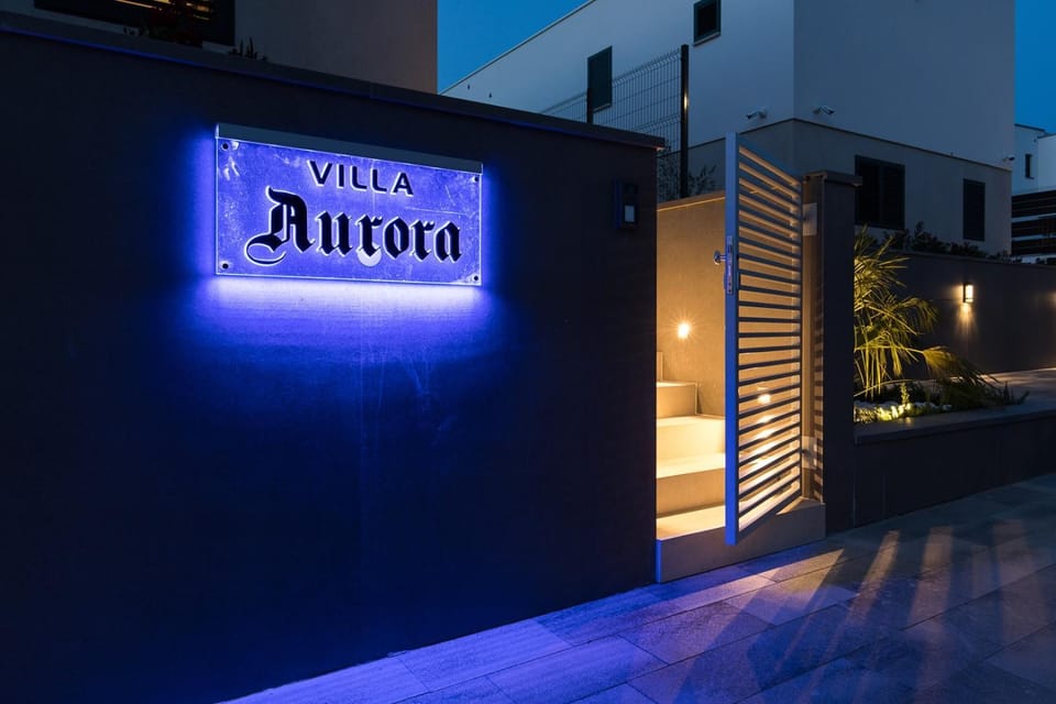 Facade/entrance, Night, Property logo or sign