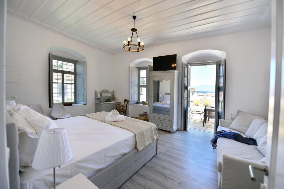 Bed, Living room, Seating area, Bedroom