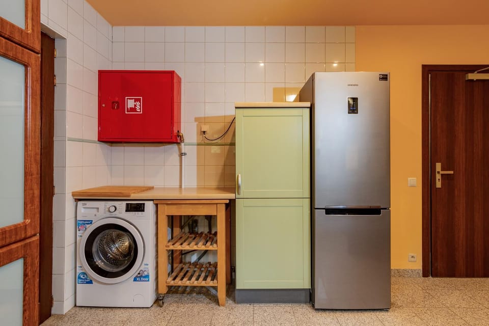Kitchen or kitchenette, washing machine