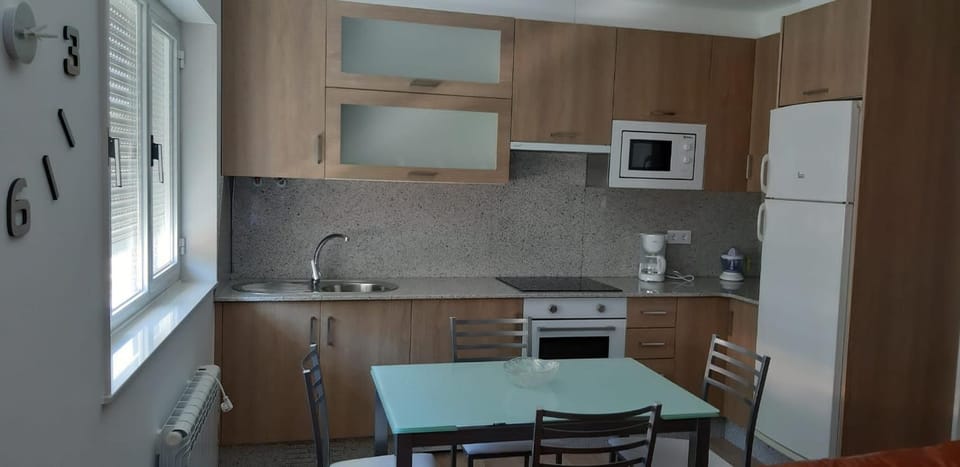 Kitchen or kitchenette, oven, stove, toaster