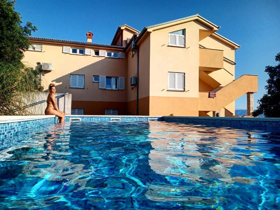 Property building, People, Swimming pool