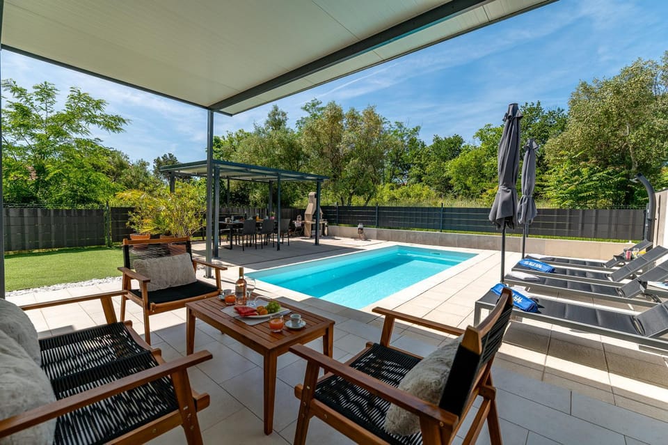 Patio, Day, Pool view, Swimming pool, sunbed
