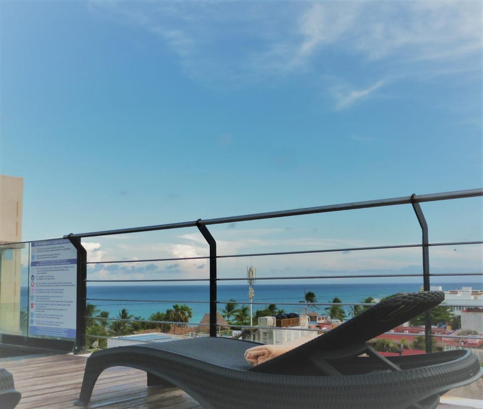 View (from property/room), Balcony/Terrace, Seating area, Swimming pool, Swimming pool